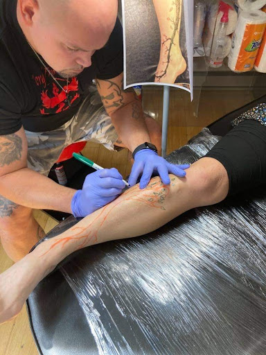 Explore mens knee tattoo ideas, creative tattoo ideas in Plattsburgh, available at Ink by Lace LLC