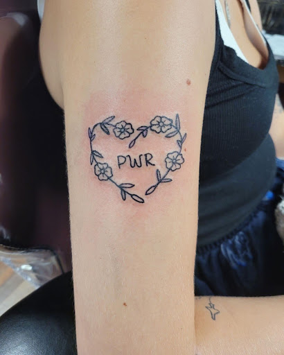 Explore ideas for thigh tattoos, creative tattoo ideas in Clarksville, available at Dark Raine Tattoo