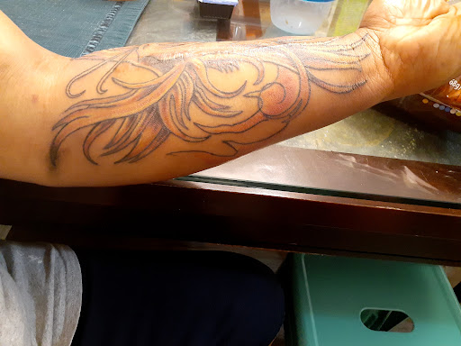 Explore angel chest tattoo ideas, creative tattoo ideas in Nicholasville, available at Castle of Color