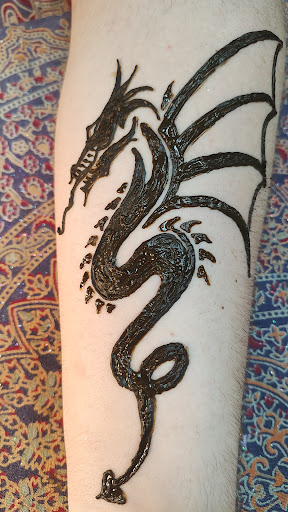 Explore sleeve tattoo fill in ideas, creative tattoo ideas in Seaside, available at Five Star Henna