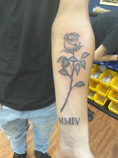 Explore back of ear tattoo ideas, creative tattoo ideas in Cocoa, available at Rorschach Tattoo Shop and Piercing Studio