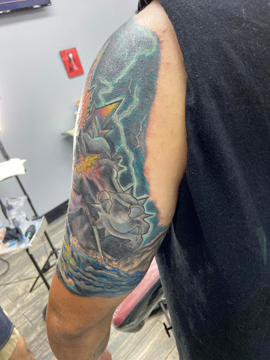 Explore mens tattoo half sleeve ideas, creative tattoo ideas in El Paso, available at American Tattoo Society of Ft Bliss