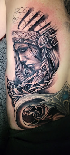 Explore comic book tattoo ideas, creative tattoo ideas in Angola, available at Hoodlum Ink