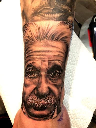 Explore cover up tattoo ideas lower back, creative tattoo ideas in Kingsford, available at Deft Tattoo Studio