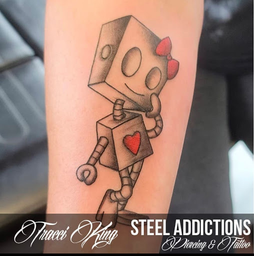 Explore skull hand tattoo ideas, creative tattoo ideas in Toledo, available at Steel Addictions