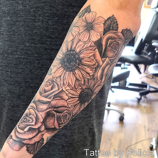 Explore music tattoo ideas sleeve, creative tattoo ideas in Fort Myers, available at Tiger Lotus Tattoo and Piercing