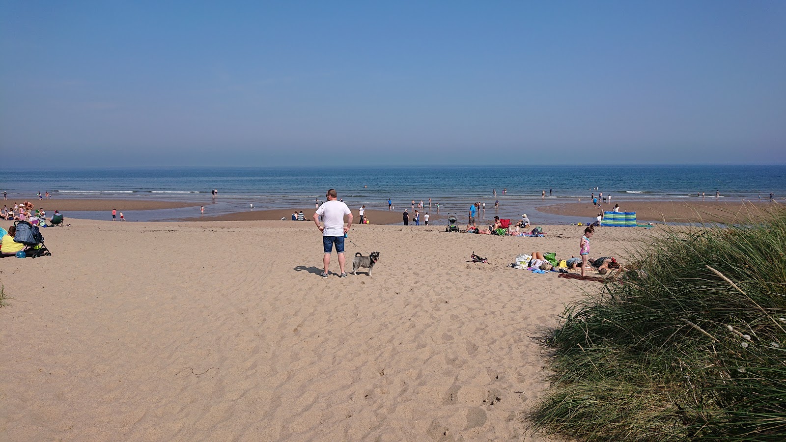 Foto van Warkworth strand met recht en lang