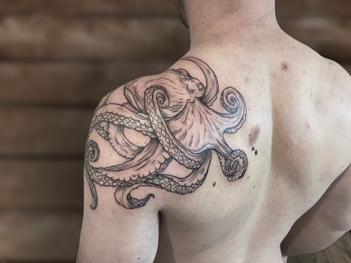 Explore father son tattoo ideas, creative tattoo ideas in Avon, available at Avanti Tattoo