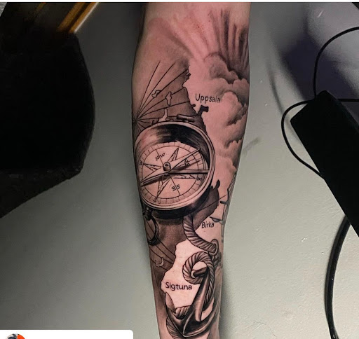 Explore ladies back tattoo ideas, creative tattoo ideas in Fort Wayne, available at Grade A Tattoos and Body Piercing