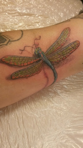 Explore elements tattoo ideas, creative tattoo ideas in Sigourney, available at Octopus Ink Professional Tattoo & Piercing