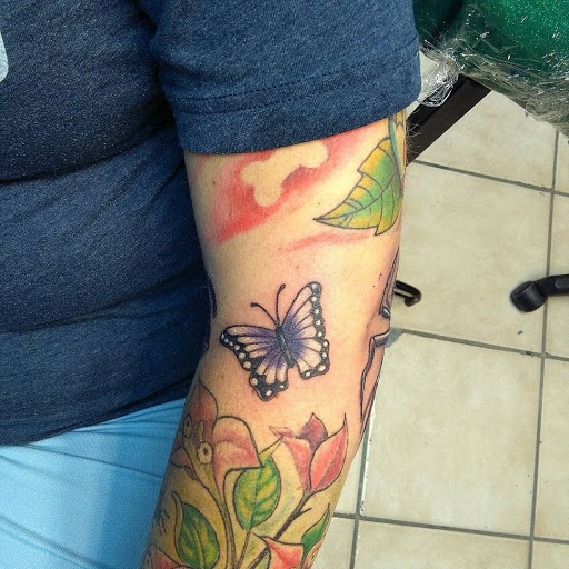 Explore feminine chest tattoo ideas, creative tattoo ideas in Bradenton, available at Memory Lane Tattoo Co.