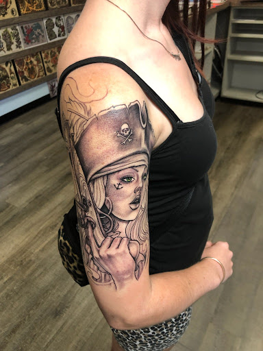 Explore slash tattoo ideas, creative tattoo ideas in Hampton, available at Ancient Art Tattoo Studio