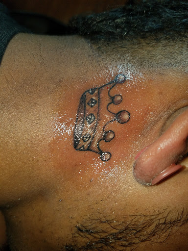 Explore tattoo time ideas, creative tattoo ideas in Lebanon, available at Erik Gwynns Beneath the Skin Tattooing & Piercing