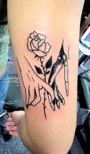 Explore family tattoo ideas for men, creative tattoo ideas in Sarasota, available at Z-Edge Tattoo and Body Piercing North Shop