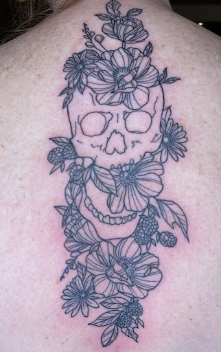 Explore tattoo ideas behind the ear tattoos, creative tattoo ideas in Broxton, available at Seratonin Tattoo Parlor