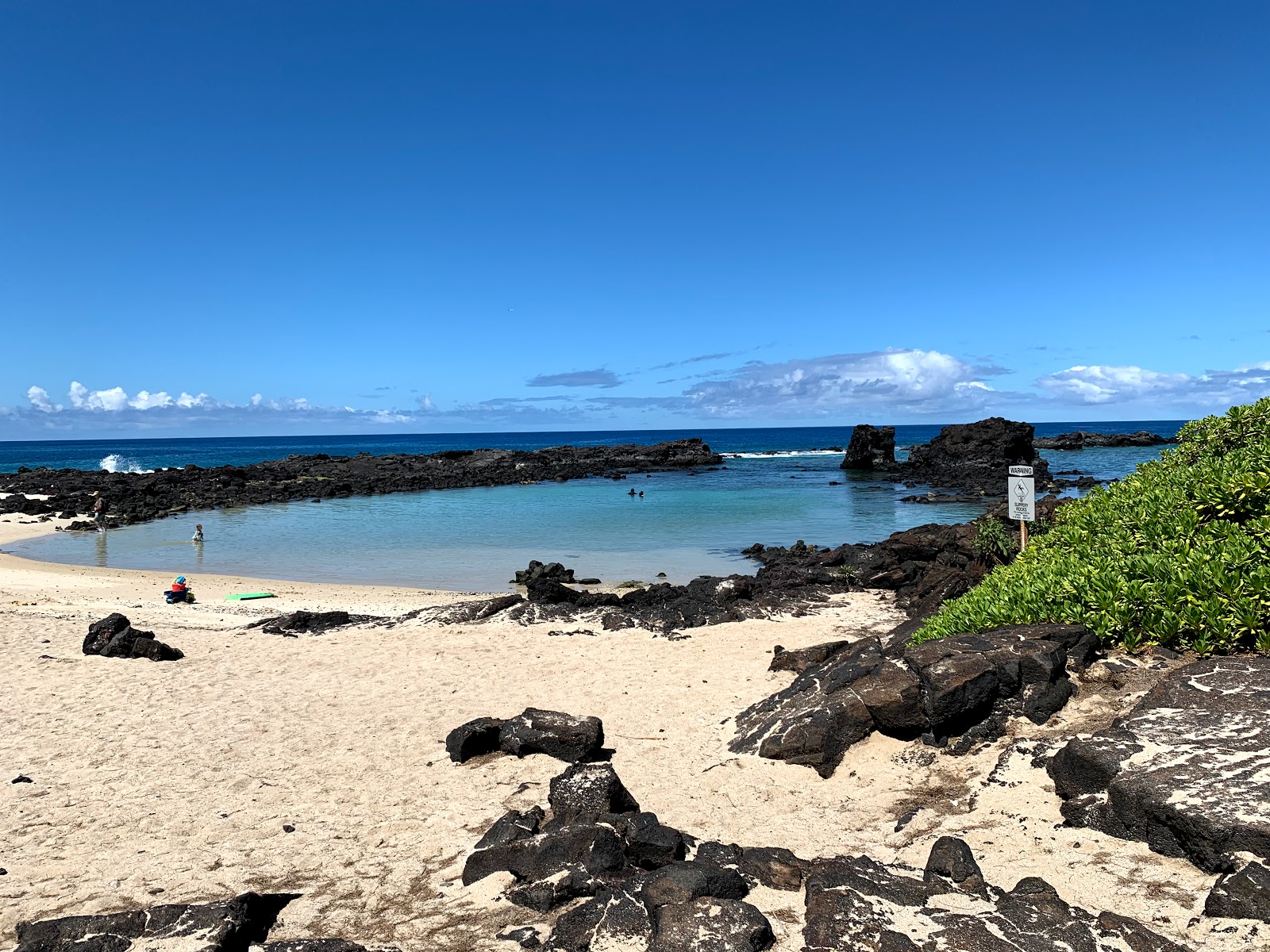 Foto de Kikaua Point Park com pequena baía