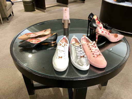 Stores to buy women's white sneakers Denver