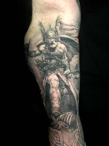 Explore tattoo fill in ideas for men, creative tattoo ideas in Sunbury, available at Absinthe Tattoo