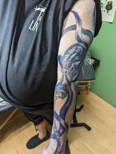 Explore trumpet tattoo ideas, creative tattoo ideas in Atlantic Beach, available at The Ink Chamber Tattoo Parlor