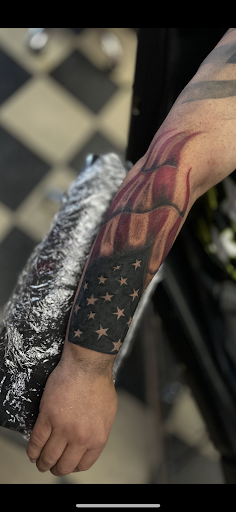 Explore skier tattoo ideas, creative tattoo ideas in Demotte, available at Revelations Tattoo Parlor