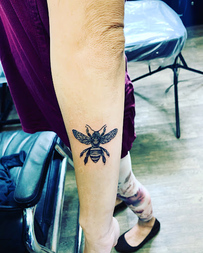 Explore memorial tattoos for brother ideas, creative tattoo ideas in Lake City, available at Crooked Spines Tattoo Studio