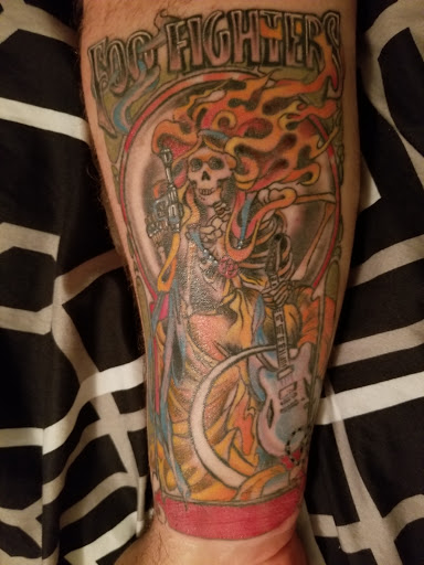 Explore thigh tattoos ideas for guys, creative tattoo ideas in Sioux City, available at Addictive Tattoo-Piercing
