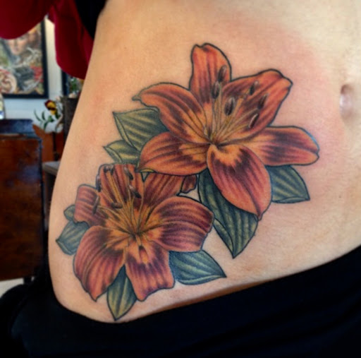 Explore rose hand tattoo ideas, creative tattoo ideas in San Diego, available at Remington Tattoo Parlor