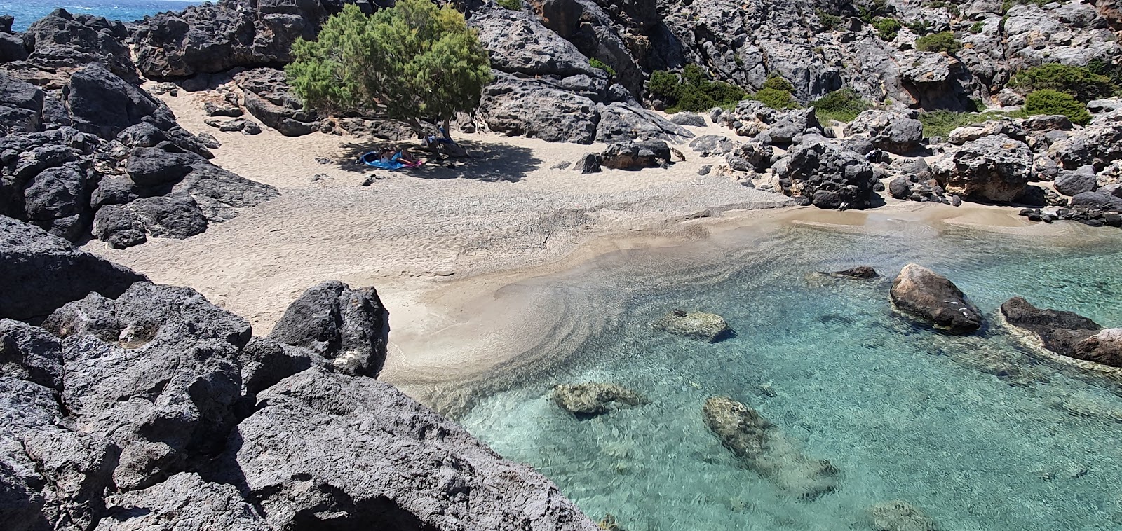 Photo of Viena beach with turquoise pure water surface