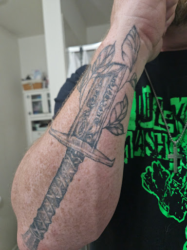 Explore god of war ragnarok tattoo ideas, creative tattoo ideas in Littleton, available at Peace of Mind Tattoo Studio