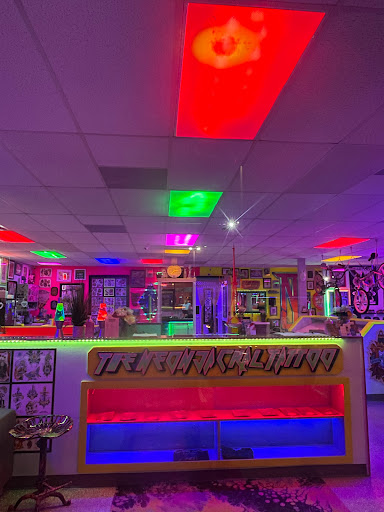 Explore small compass tattoo ideas, creative tattoo ideas in Houston, available at The Neon Jackal Tattoo