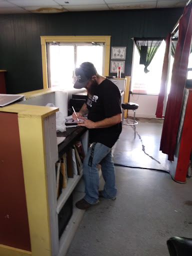 Find background tattoo ideas for guys for your next unique tattoo in Cherokee at Indian Ink Tattoo Studio