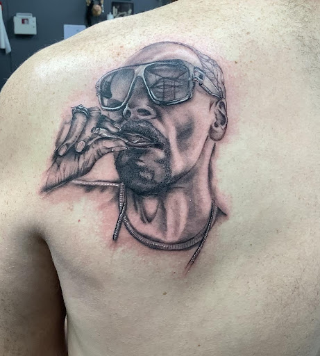 Explore hen tattoo ideas, creative tattoo ideas in Abilene, available at Sacred Art