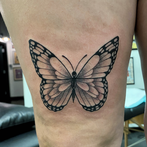 Explore sunflower and butterfly tattoo ideas, creative tattoo ideas in Raleigh, available at Raleigh Tattoo Company