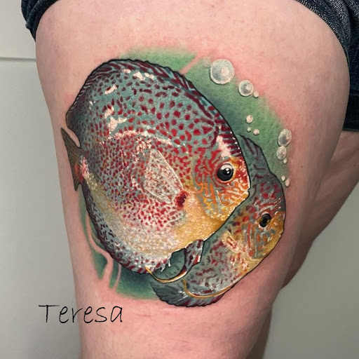 Explore hood neck tattoo ideas, creative tattoo ideas in Sanford, available at Venom Ink Tattoo