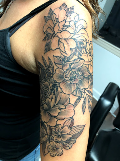 Explore butterfly cover up tattoo ideas, creative tattoo ideas in Wake Forest, available at Revelation Ink Tattoo and Piercing