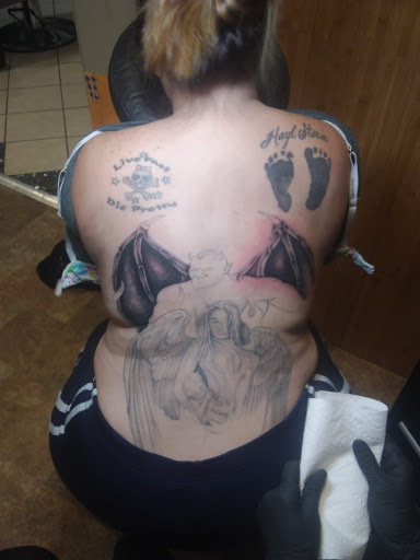 Explore tangled tattoo ideas, creative tattoo ideas in Fort Oglethorpe, available at Wicked Eyes Tattoo Art Gallery