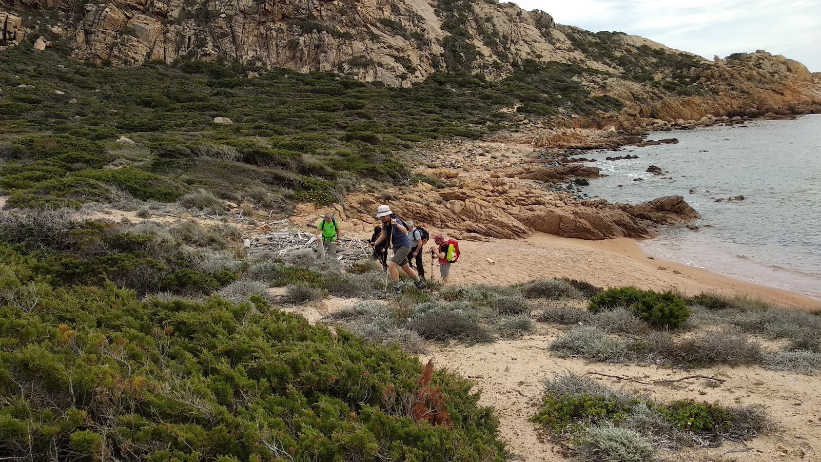 Photo of Capo di Feno II with brown sand &  rocks surface