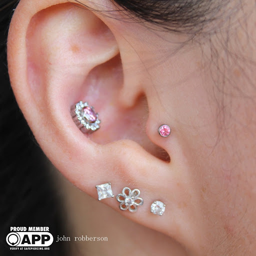 Find mom of 4 tattoo ideas for your next unique tattoo in Fort Myers at Tiger Lotus Tattoo and Piercing