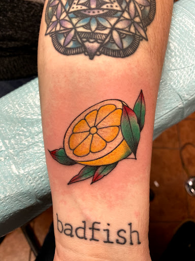 Explore bear paw tattoo ideas, creative tattoo ideas in Osage Beach, available at Rabbits Foot Tattoo Parlor