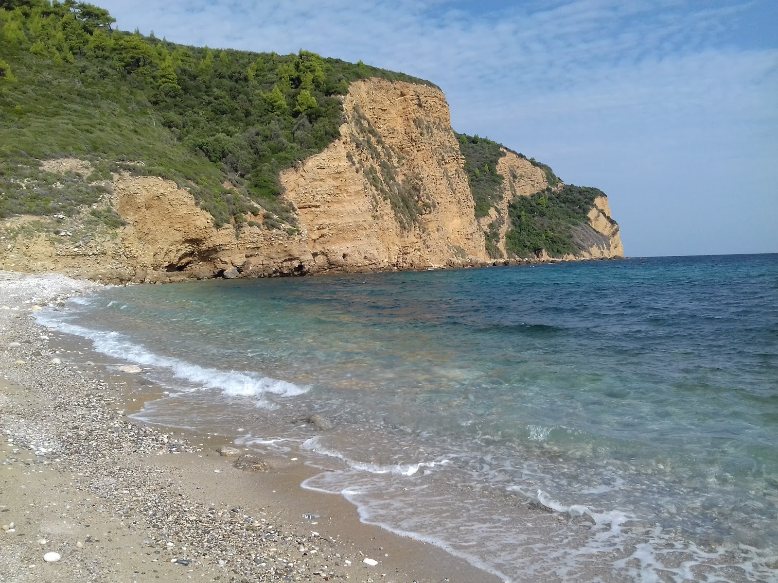 Foto de Theotokos beach com pequena baía