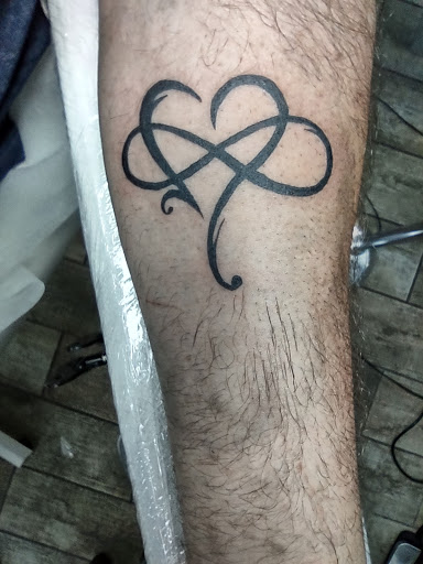 Explore men's tattoo ideas forearm, creative tattoo ideas in Buford, available at Wild Tribe Tattoos and Piercings