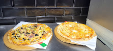 Photos du propriétaire du Pizzeria Domicile Pizza à Paris - n°13