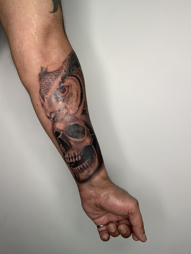 Explore women's wrist tattoo ideas, creative tattoo ideas in Roselle Park, available at Sola Ink