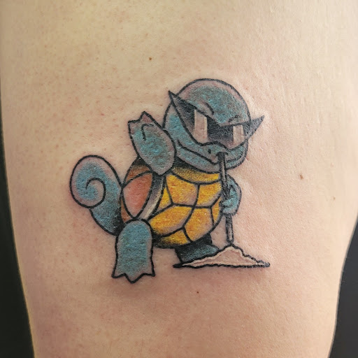 Explore filmmaker tattoo ideas, creative tattoo ideas in Rochester, available at Body Creations Tattoo & Body Piercing