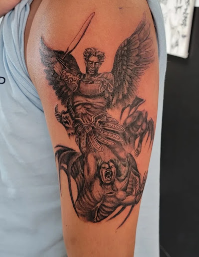 Explore tattoo ideas for your legs, creative tattoo ideas in Salem, available at Mayhem Tattoo