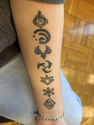 Find tattoo ideas roses for your next unique tattoo in Oneonta at Free Agent