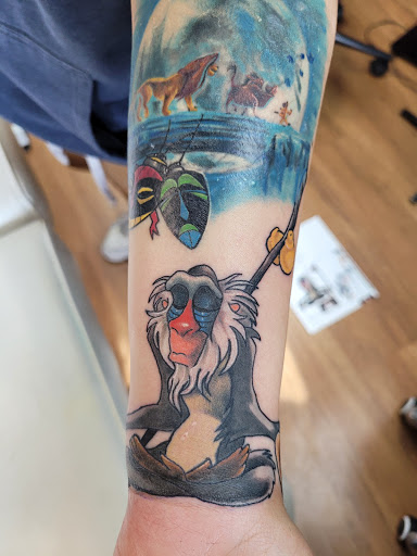 Explore wrestling tattoo ideas, creative tattoo ideas in Fernley, available at Speakeasy Tattoo Co.