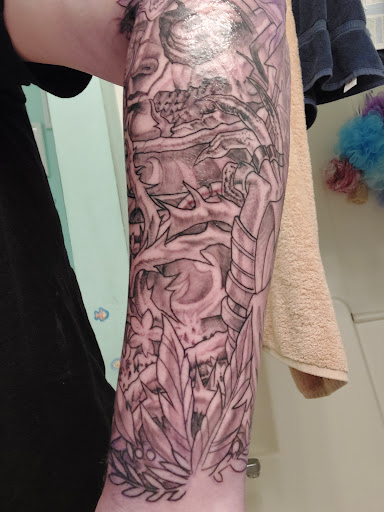 Explore cat and dog tattoo ideas, creative tattoo ideas in Virginia Beach, available at Studio Evolve