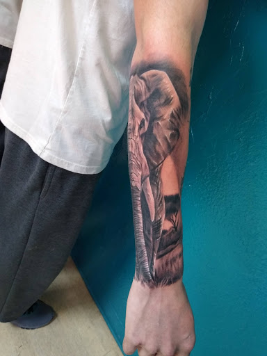 Explore tattoos with names ideas, creative tattoo ideas in Hereford, available at Slow Pain Tattoo Body Art Studio