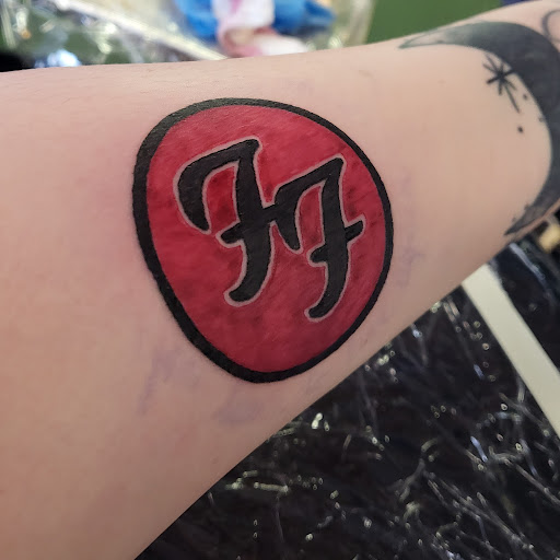 Explore pet memory tattoo ideas, creative tattoo ideas in Milwaukee, available at Atomic Tattoos